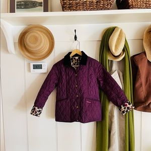 Classic girls’ quilted Barbour barn jacket.